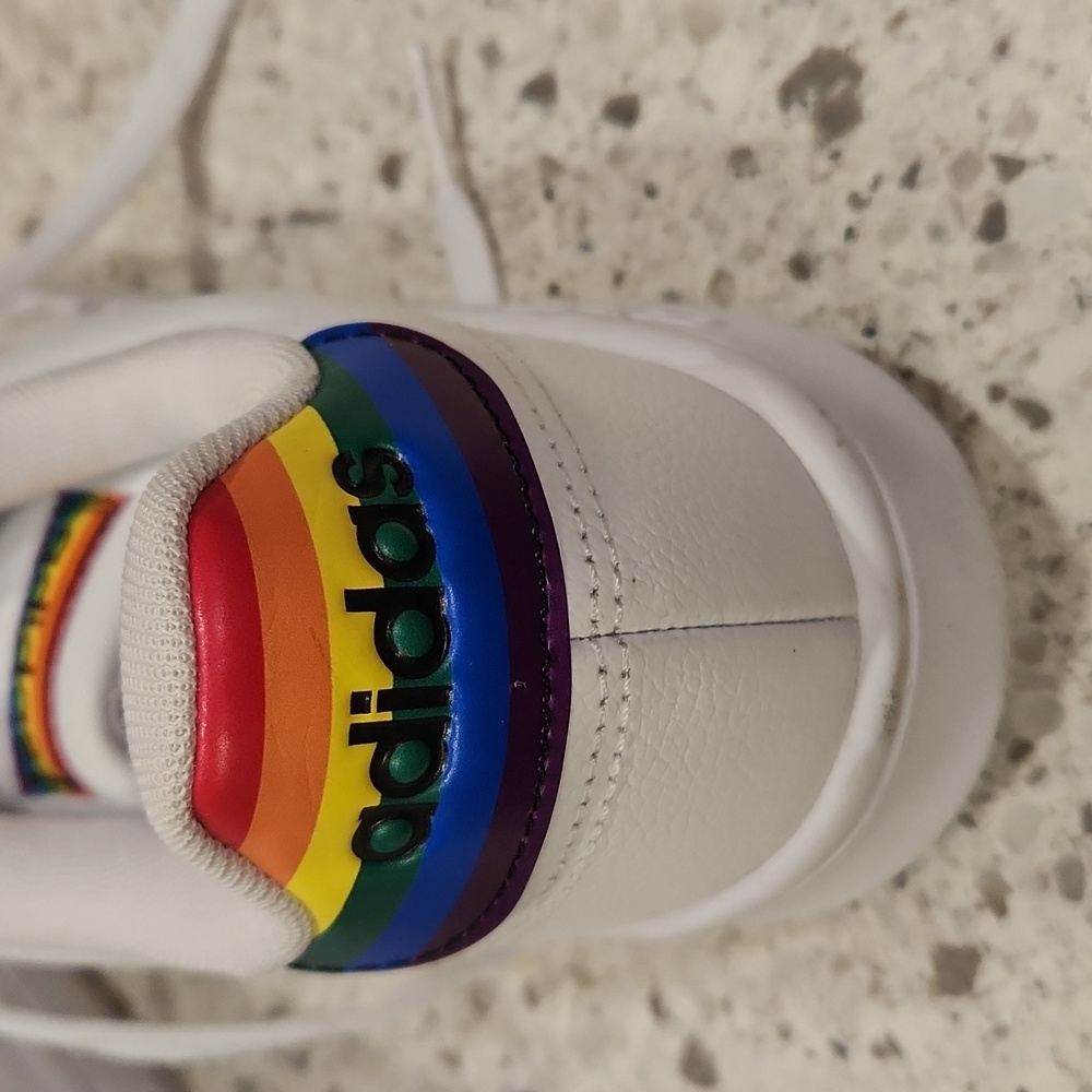 Adidas brand shoes with 🌈  logo
